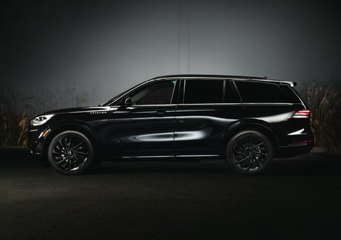 A 2024 Lincoln Aviator® SUV is shown in the Infinite Black exterior color | George Ballentine Lincoln in Greenwood SC