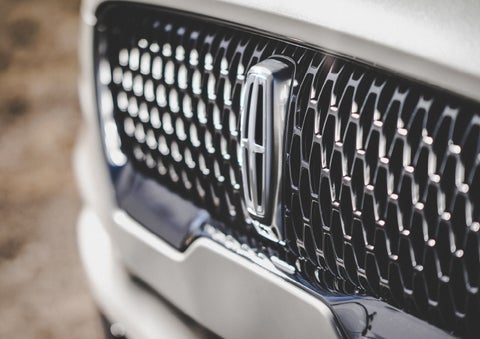 The grille of the 2024 Lincoln Aviator® Reserve model with an eye-catching repeated field of Lincoln Star logo shapes | George Ballentine Lincoln in Greenwood SC