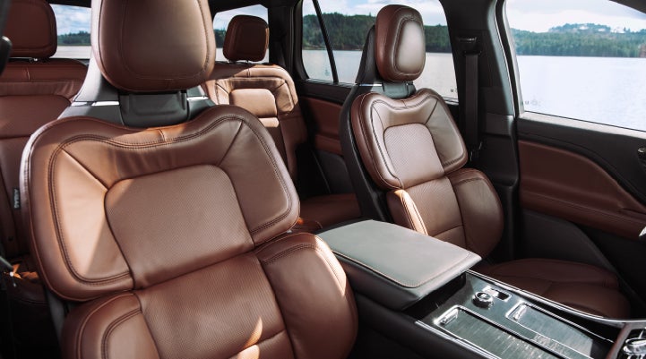 The front row's Perfect Position Seats in a 2024 Lincoln Aviator® Reserve model with Ebony Roast interior | George Ballentine Lincoln in Greenwood SC