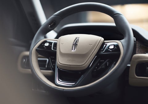 The intuitively placed controls of the steering wheel on a 2024 Lincoln Aviator® SUV | George Ballentine Lincoln in Greenwood SC