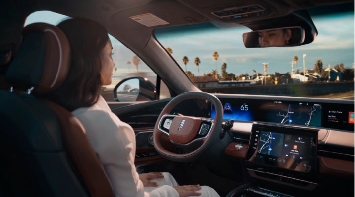 A person is shown driving hands-free on the highway with available Lincoln BlueCruise technology. | George Ballentine Lincoln in Greenwood SC