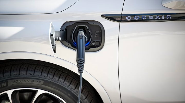 An electric charger is shown plugged into the charging port of a Lincoln Corsair® Grand Touring
model. | George Ballentine Lincoln in Greenwood SC